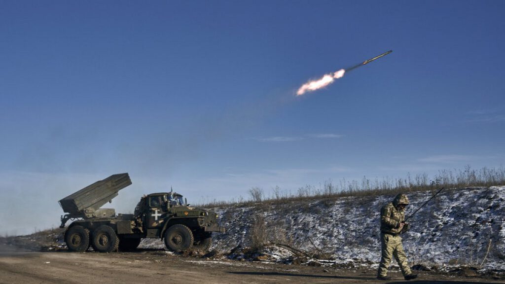 FILE - Ukrainian army Grad multiple rocket launcher fires rockets at Russian positions in the frontline near Soledar, Donetsk region, Ukraine, Wednesday, Jan. 11, 2023.