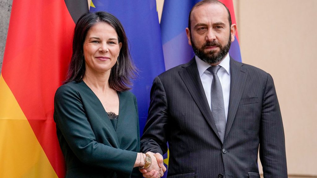 German Foreign Minister Annalena Baerbock, left, welcomes Armenia
