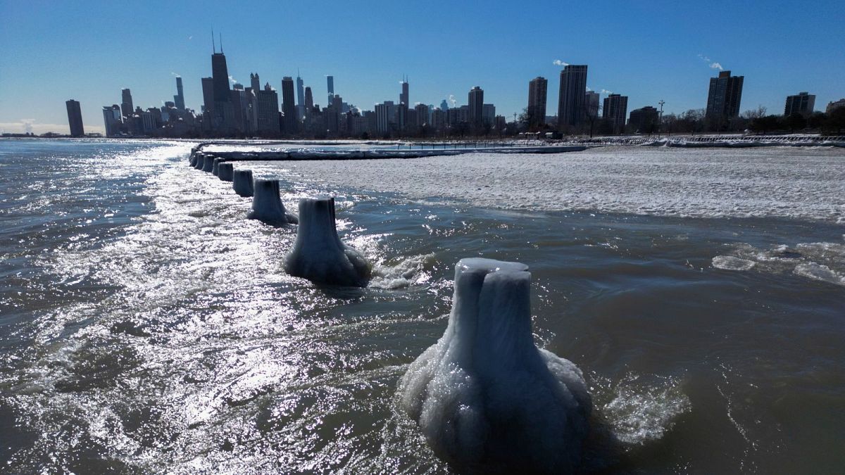 A layer of ice covers Lake Michigan, 2 February 2023, in Chicago.