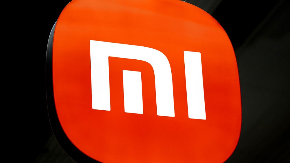 The Xiaomi logo is seen at the Mobile World Congress 2023 in Barcelona, Spain, Tuesday, Feb. 28, 2023. (AP Photo/Joan Mateu Parra)