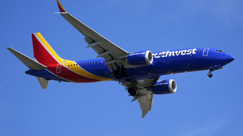 A Southwest airlines plane lands at Sarasota International Airport in Sarasota, Fla., on Monday, February 9, 2024 (AP Photo/Gene J. Puskar)