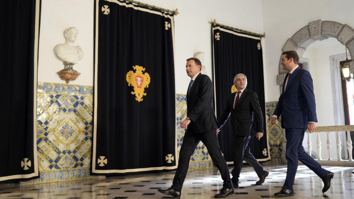 Centre-right Democratic Alliance coalition leader Luis Montenegro (left) at the Belem presidential palace in Lisbon, Wednesday, March 2, 2024.