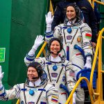 NASA astronaut Tracy Dyson, centre, Oleg Novitsky of Roscosmos, bottom, and Marina Vasilevskaya of Belarus