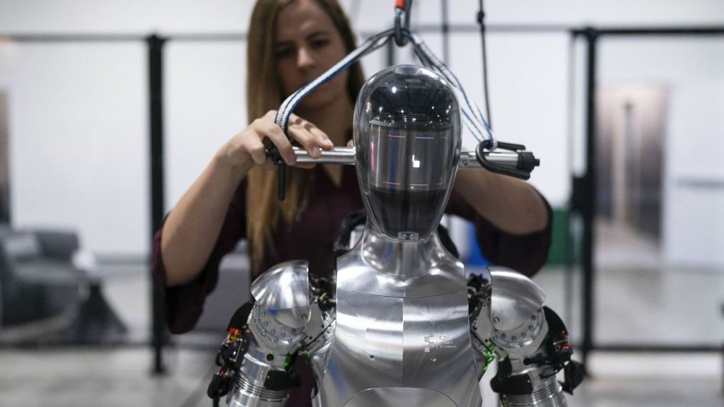 AI engineer Jenna Reher works on humanoid robot Figure 01 at Figure AI