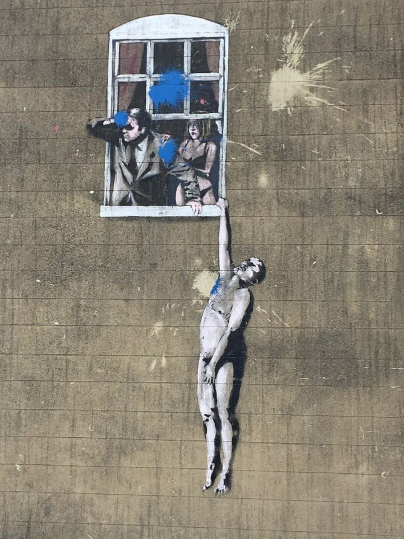 Banksy'ego "Dobrze zawieszony kochanek"