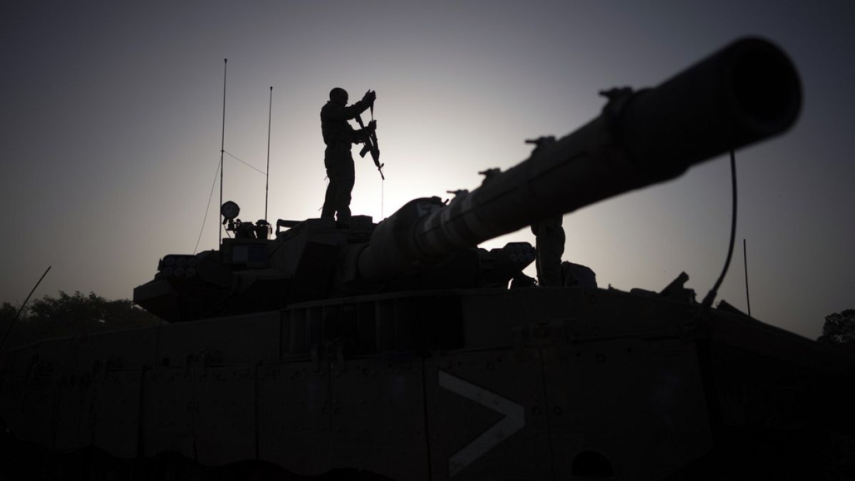 An Israeli troop on a tank.