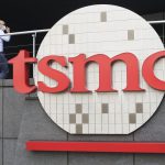 A person walks into the Taiwan Semiconductor Manufacturing Co., Ltd. (TSMC) headquarters in Hsinchu, Taiwan on Oct. 20, 2021.