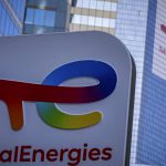 The logo of TotalEnergies is seen at an electric vehicle fuelling station in La Defense business district in Courbevoie near Paris, France, Wednesday, March 1, 2023. (AP Photo