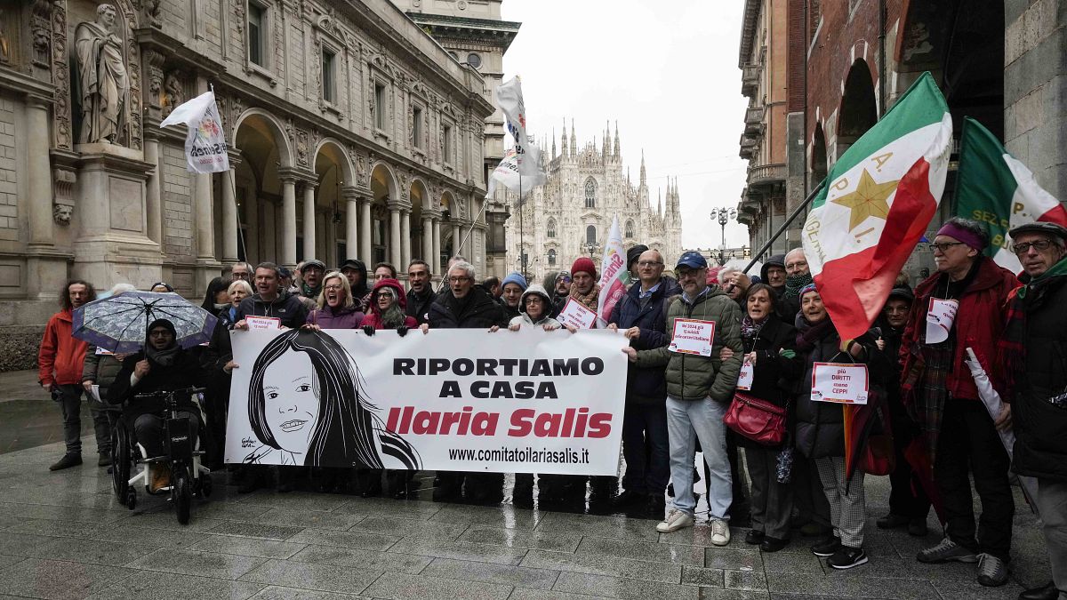 People gather to raise awareness of the case of the Italian antifascist activist Ilaria Salis detained in Hungary, in Milan, Italy, Saturday, Feb. 10, 2024