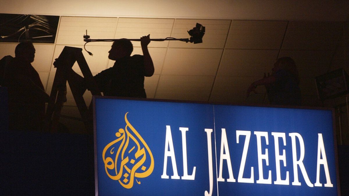 Workmen put the finishing touches on the media skybox for the Al-Jazeera satellite news channel inside Madison Square Garden in New York  (AP Photo/Charlie Neibergall)