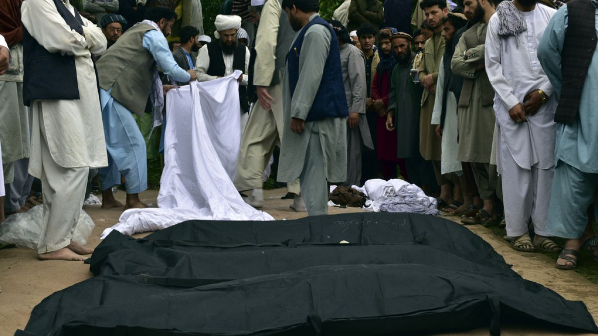 Dead bodies after heavy flooding in Baghlan province in northern Afghanistan Saturday, May 11, 2024.