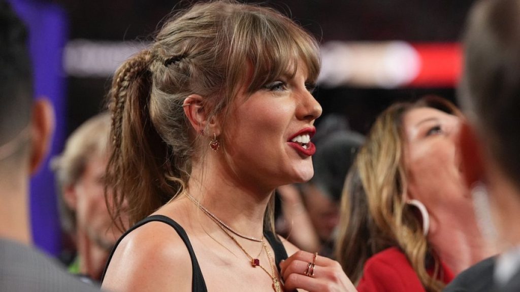 Taylor Swift watches the celebration on the field after the NFL Super Bowl 58 football game between the Kansas City Chiefs and the San Francisco 49ers. Feb. 11, 2024.