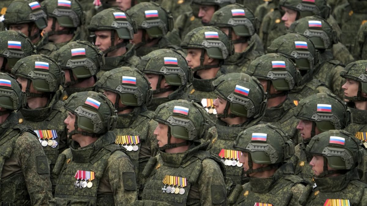 Russian soldiers march during the Victory Day military parade dress rehearsal at the Red Square in Moscow, Russia, Sunday, May 5, 2024.