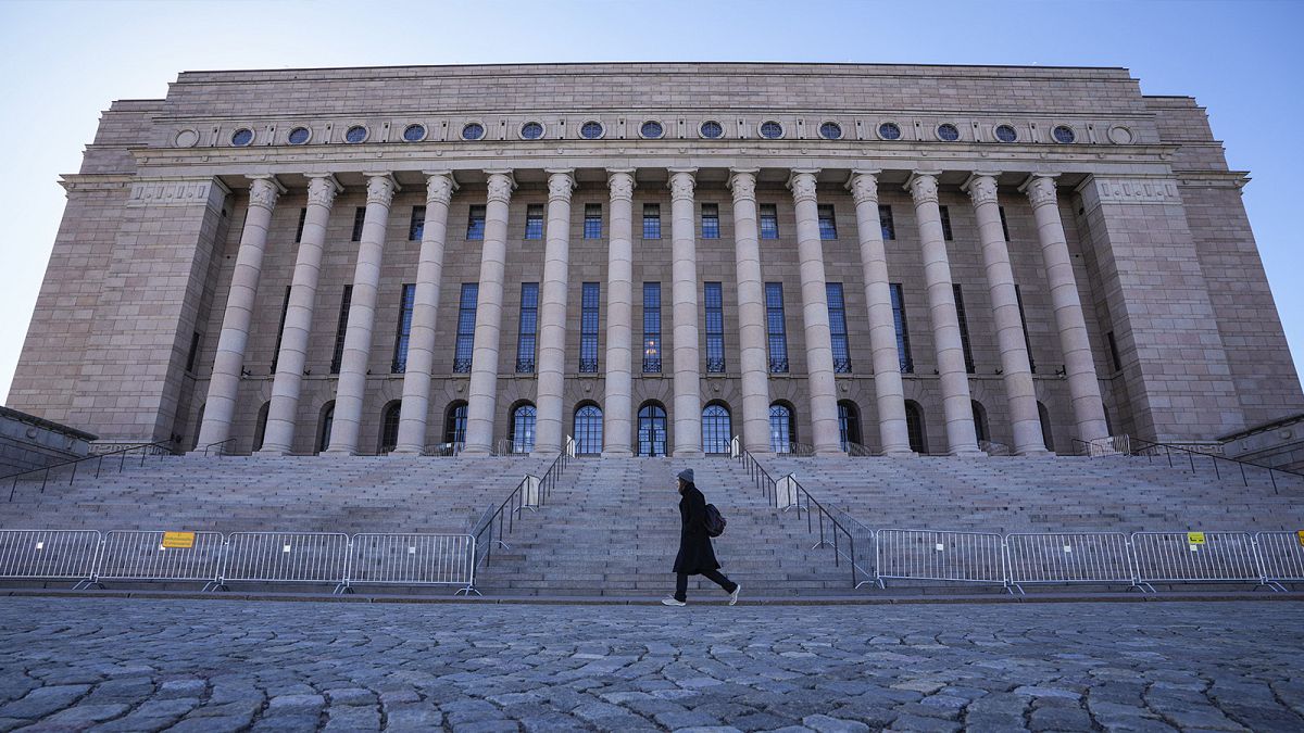 A person walks past Finland