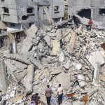 Palestinians look at the destruction after an Israeli airstrike in Rafah, Gaza Strip. Monday, April 29, 2024.