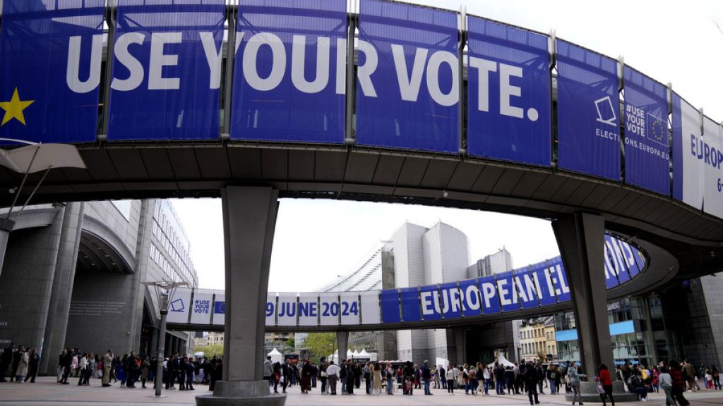 People wait in line to visit the European Parliament during Europe Day celebrations in Brussels on May 4, 2024.