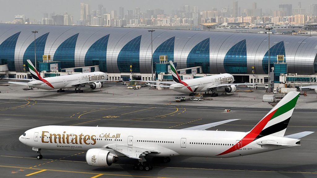 An Emirates plane taxis to a gate at Dubai International Airport at Dubai International Airport in Dubai, United Arab Emirates