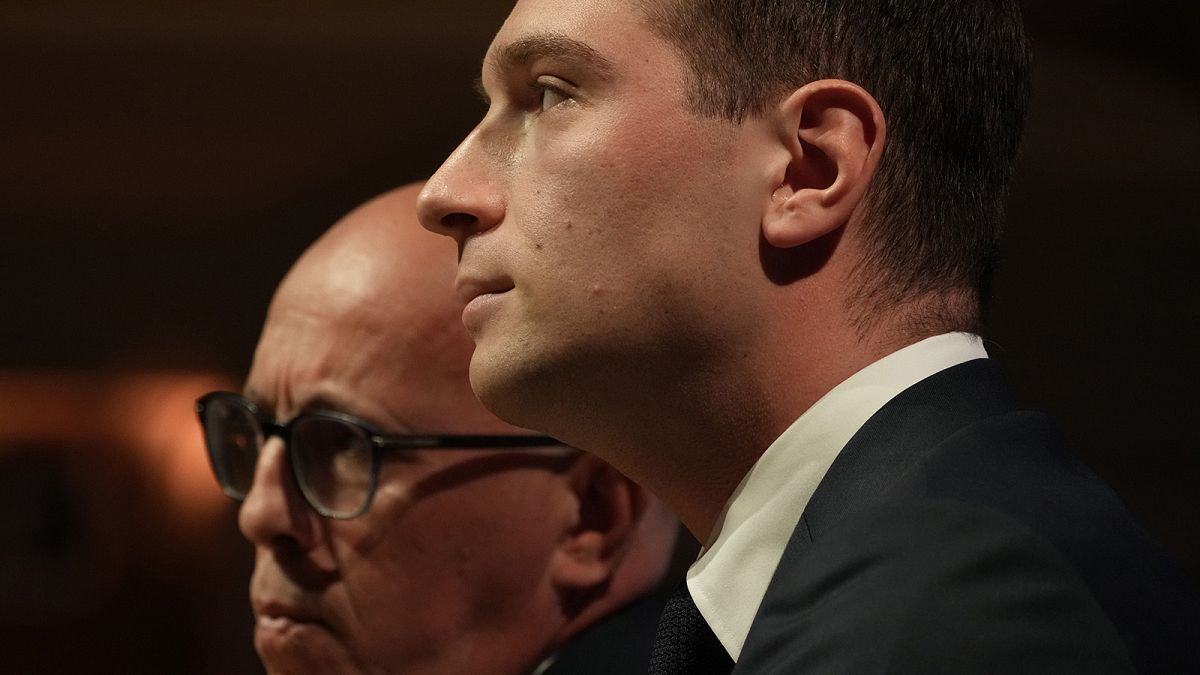 Eric Ciotti, left, President of the conservative party Les Republicains, and far-right National Rally party president Jordan Bardella attend a meeting with the French business