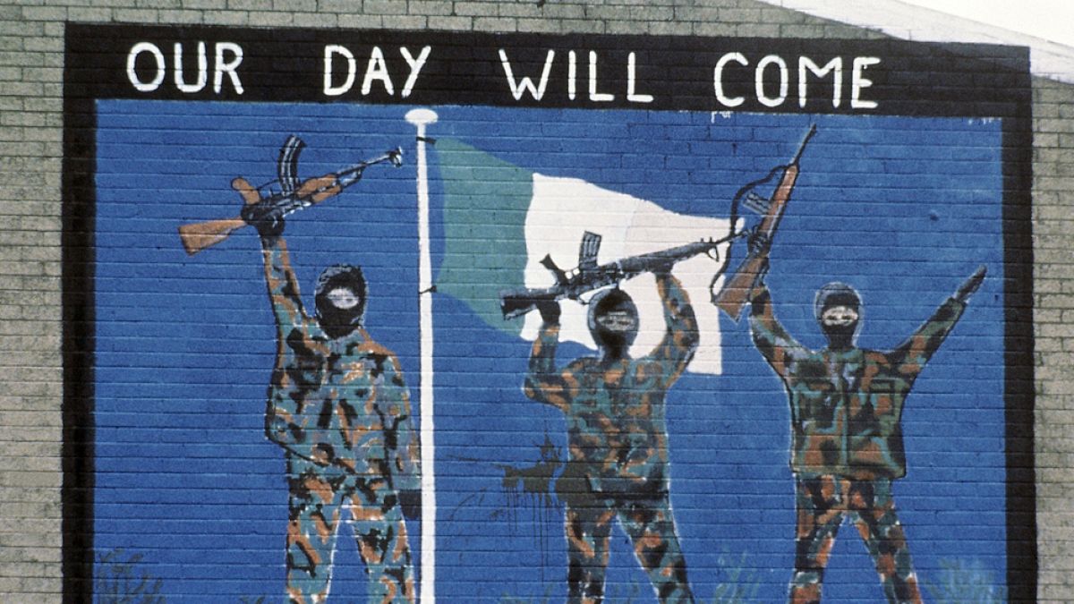 FILE - A wall painting supporting the Irish Republican Army, seen in the Catholic area of Belfast, Northern Ireland on Nov. 1985.
