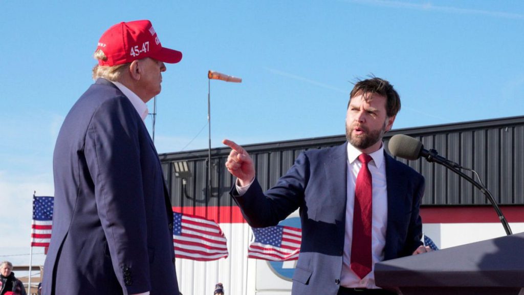 Sen. J.D. Vance, R-Ohio, right, points toward Republican presidential candidate former President Donald Trump at a campaign rally, March 16, 2024, in Vandalia, Ohio.