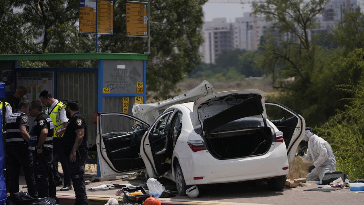 Israeli security forces examine the scene of a suspected ramming attack near Ramla, Israel Sunday, July 14, 2024.