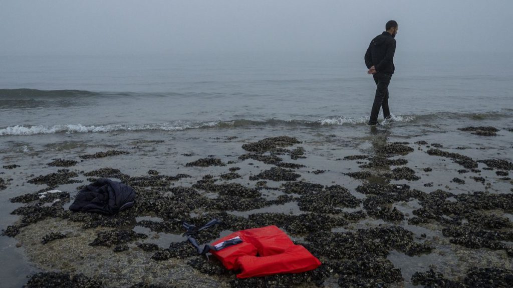 A Kurdish migrant who failed in his attempt to reach the United Kingdom by boat walks back to the town of Ambleteuse, in northern France, on Sunday, May 19, 2024