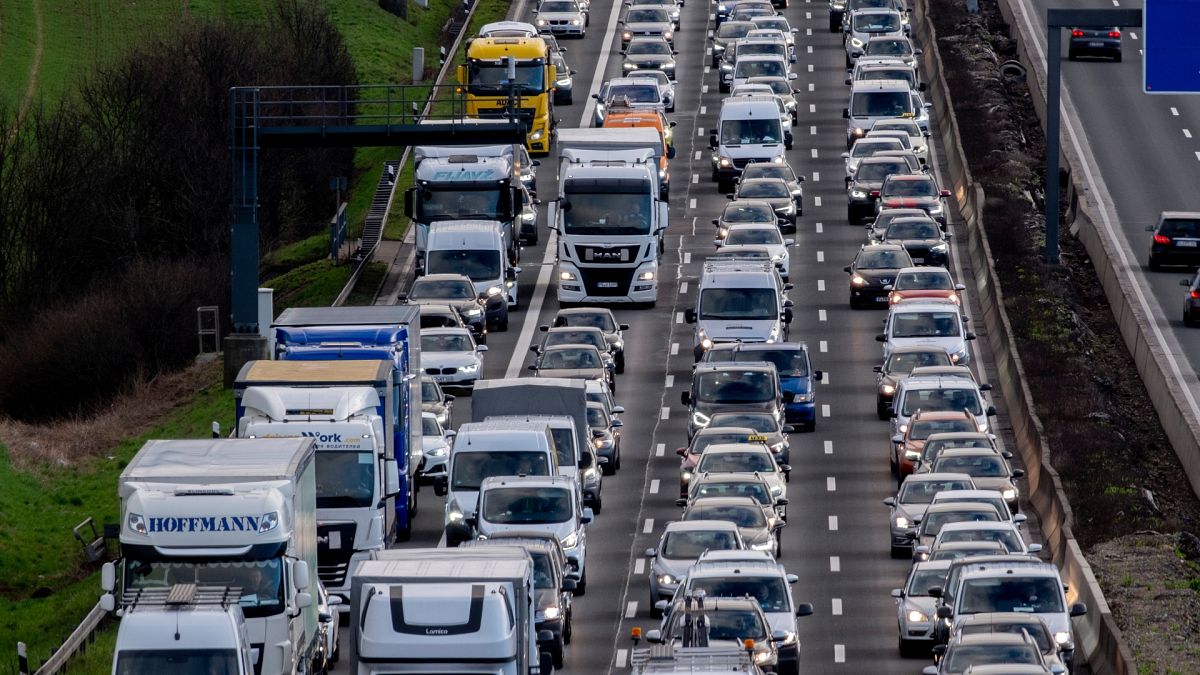 Traffic rolls on a highway in Frankfurt, Germany.
