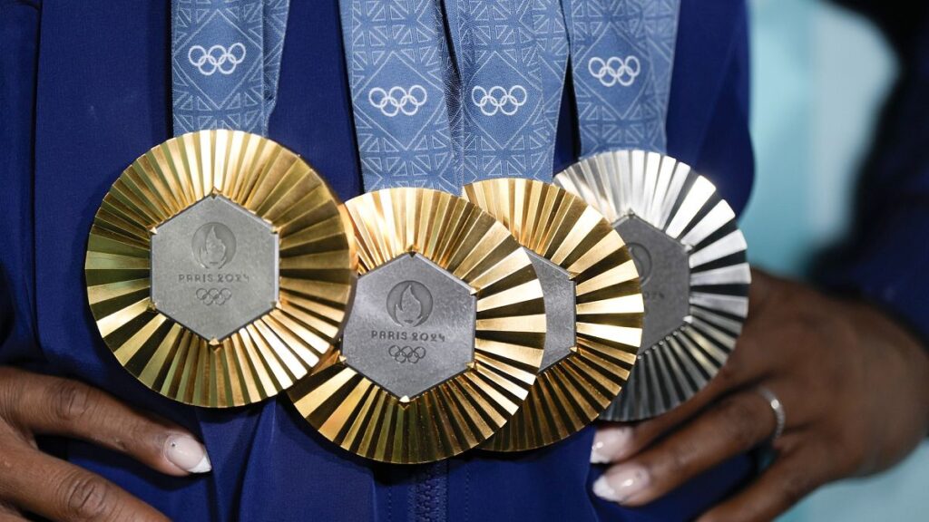 US gymnast Simone Biles displays her medals - will the Olympics turn France