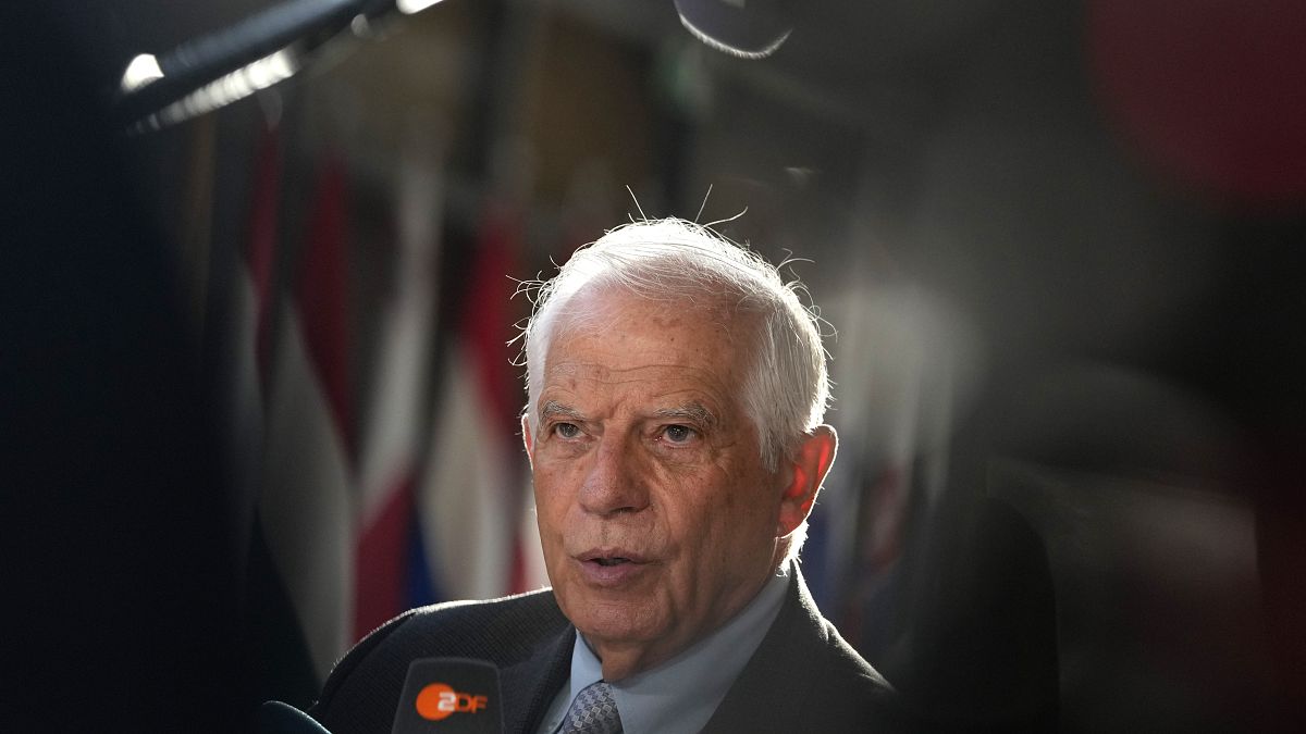 EU foreign policy chief Josep Borrell speaks with the media as he arrives for a meeting of foreign ministers in Brussels, August 29, 2024