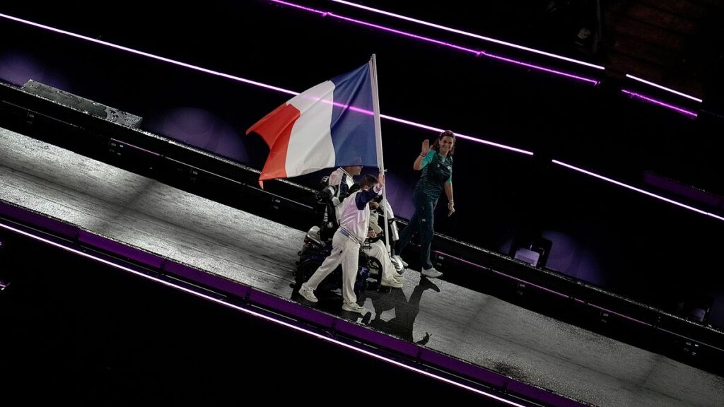 Members of the French delegation parade during the closing ceremony of the 2024 Paralympics in Paris, 8 September 2024