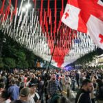 Demonstrators gather at the Parliamentary building during an opposition protest against the foreign influence bill in Tbilisi.