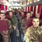 Screengrab from video released by Russian Defence Ministry showed Russian military personnel on a bus travelling through an undisclosed location, September 14th 2024