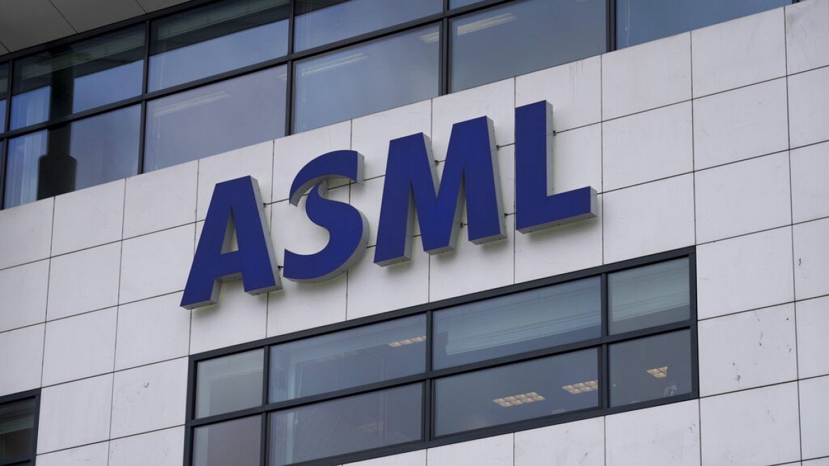 FILE - the logo of ASML, a leading maker of semiconductor production equipment, hangs on the head office in Veldhoven, Netherlands, Monday, Jan. 30, 2023.