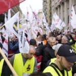 Some 300 Polish coal miners angered by the European Union directive reducing methane emissions protest noisily before the EU office saying it will deprive them of their jobs.