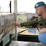 Capt. Hector Alonso Garcia of the Spanish UNIFIL battalion, at an observation tower in Abbassiyeh, a Lebanese border village with Israel, 10 January 2024