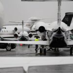 Planes are parked at a private jet terminal at Harry Reid International Airport ahead of the Super Bowl.